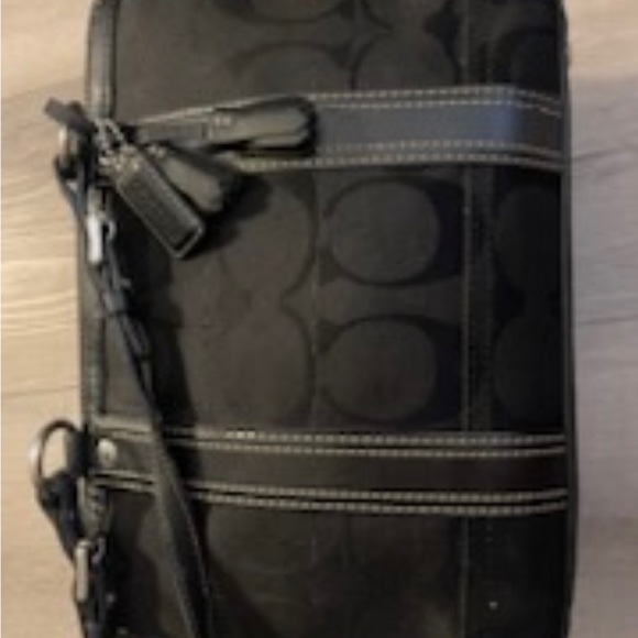 It’s a large signature C coach logo printed all over it - Picture 7 of 15